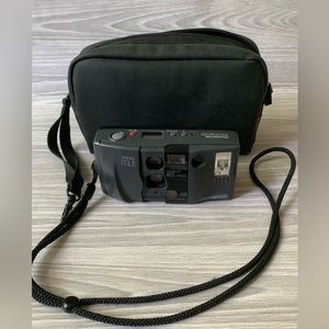 Olympus Infinity Tele Film Camera 35 mm Auto Focus Point Shoot untested.